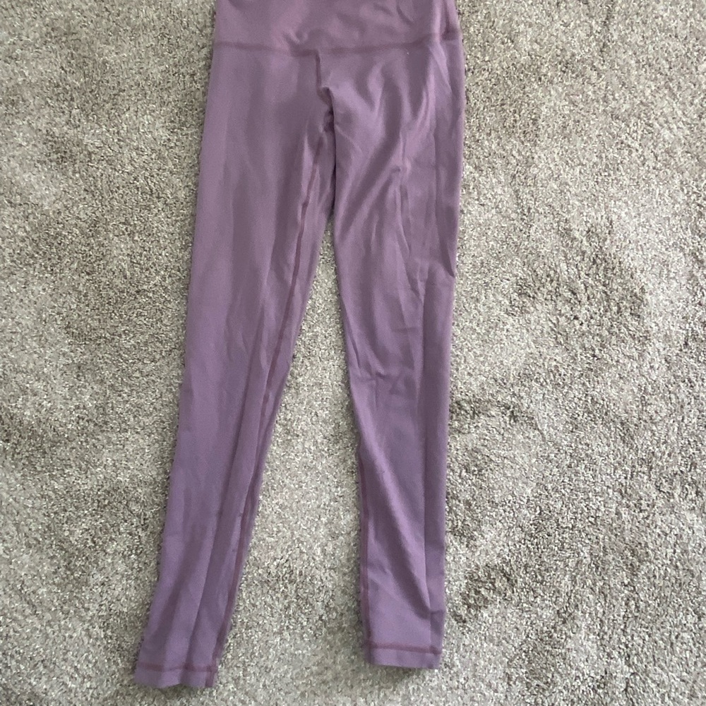 Purple leggings. Gently used